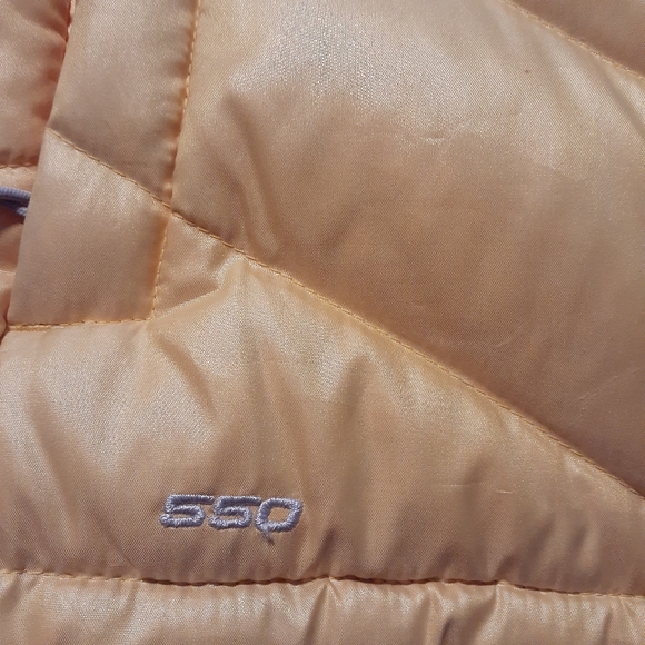 The North Face 550 down Vest.  Size small, yellow color - Picture 4 of 6